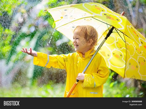 Child Playing Rain Image And Photo Free Trial Bigstock