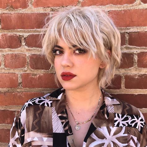 Platinum Short Shaggy Bob With Messy Wavy Texture And Fringe Bangs