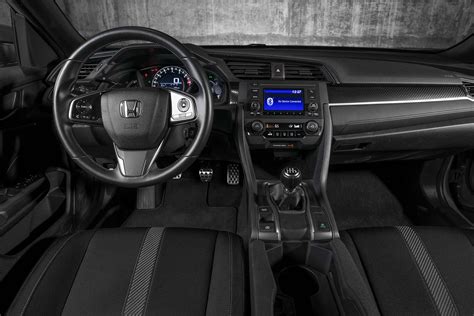 The car brings 47 litres fuel capacity with fuel consumption around 5.8 liters per 100 km for variants with 1.5l vtec turbo engine. 2017 Honda Civic Hatchback Sport interior - Motor Trend en ...