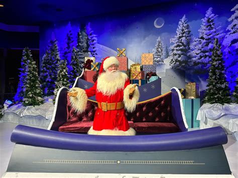 photos video santa claus greets guests of all ages at the odyssey pavilion for the 2022 epcot