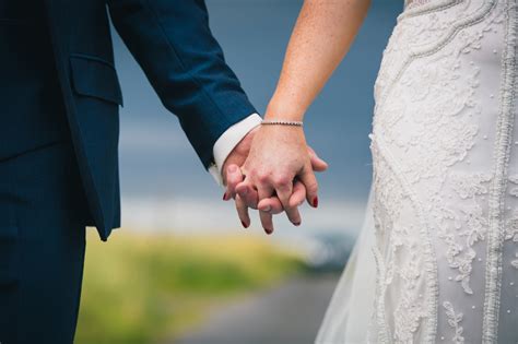 Sligo Wedding Photographer Bride And Groom Hold Hands