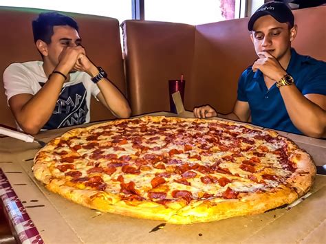 * my late friend in the big chain pizza business got into it because one could train any 16 year old to run it. The Giant 32-Inch Pizza At Gus's In Phoenix Is Bigger Than ...