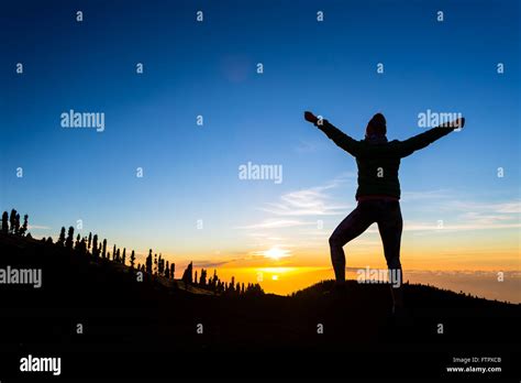 Woman Hiker Silhouette With Arms Outstretched In Mountains Female