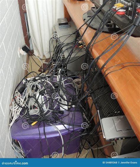 Electrical Cords Connected To Power Strip And Electricity Bill With