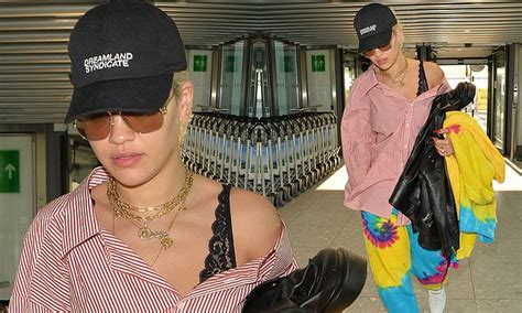 Rita Ora Puts On Quirky Display In Loose Shirt And Tie Dye Trousers