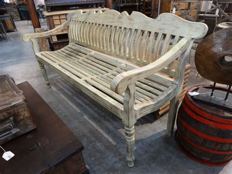 Wood Bench features fancy shapely pieces for old world charm.