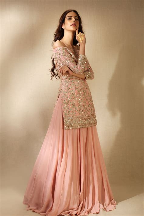 We did not find results for: off shoulder pastel pink embroidered sharara suit set ...