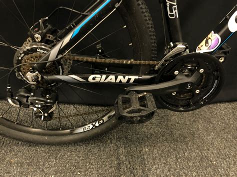 Black And Blue Giant Atx 21 Speed Front Suspension Mountain Bike With