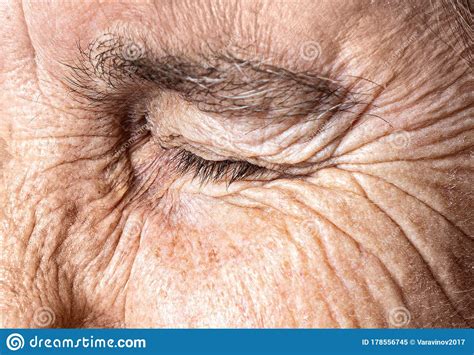 Old Age Concept Close Up Eye Of An Elderly Woman With A Wrinkled Face