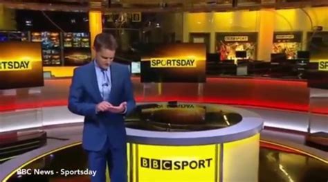 It's the best way to follow all the latest sporting action! BBC Sport presenter pretends his hand is an iPad