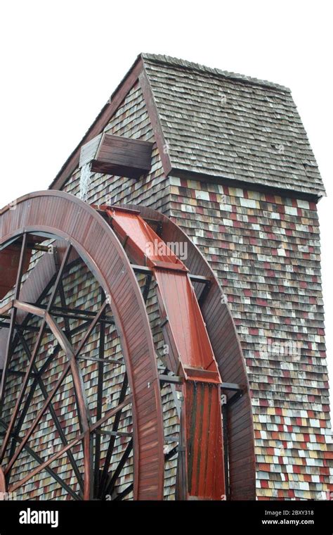 Isolated Giant Water Wheel For A Old Mill Stock Photo Alamy