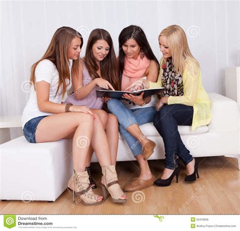 Dear best friend, i wish you all the love, happiness, and success of this world. Four Female Friends Looking At A Folder Stock Image ...