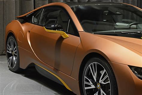 The i8 looks like it is a model 2030 or something like that. BMW i8 Shows Up Wearing Yellow Highlights | Carscoops