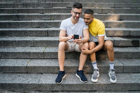 Free Photo Portrait Of Happy Gay Couple Spending Time Together And Having A Date At The Park