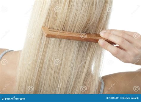 blonde woman brushing her hair stock image image of close caucasian 13356311