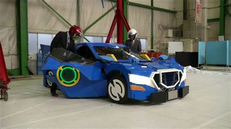 Engineers Create Robot That Transforms Into Car With Men On Board The