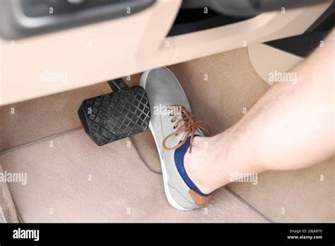 Foot Pressing Pedal Of Car Stock Photo Alamy