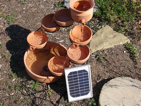 Diy solar powered water fountain (via solarpanelspower) 24 of 25. 25 Awesome Handmade Outdoor Fountains - Shelterness