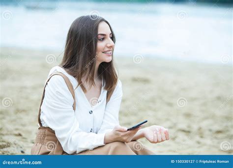 Girl Outdoors Texting On Her Mobile Phone Girl With Phone Portrait Of A Happy Woman Text Sms