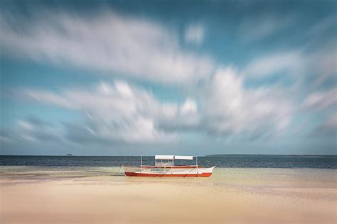 Lonely Boat In The Sand Of The Beach Photograph By Sergio Florez Alonso