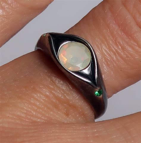 Blackened Sterling Silver Ethiopian Opal And Green Spinel Eye Ring