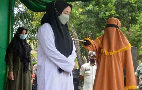 Indonesian Woman Flogged 100 Times For Adultery Partner Gets 15 Raw