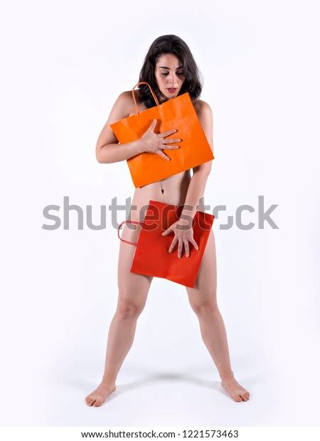 Naked Woman Covering Herself Recycled Paper Foto Stock