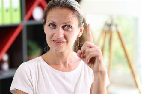 Female Shows Gesture With Her Index Finger Up Stock Photo Image Of
