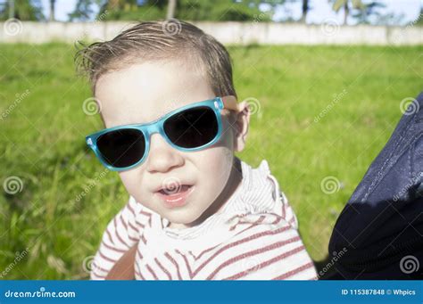Portrait Of Toddler Boy With Sunglasses For Children A Sunny Day Stock