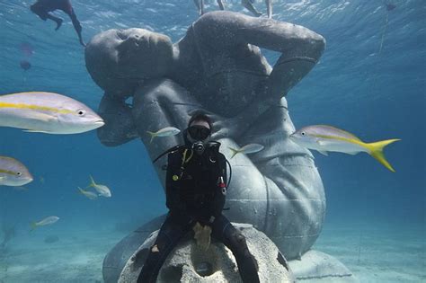 Ocean Atlas Massive Underwater Statue Of Girl Carrying The Ocean On