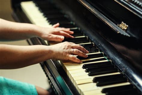 Beautiful Woman Playing Pianoclose Up Of Woman Hands Playing Pi Stock