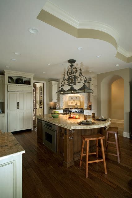 Traditional Kitchen With Curved Tray Ceiling To Match The Curve In The