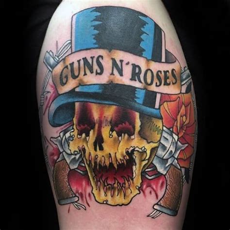This tattoo definitely scores brownie points for innovative conceptualization. 40 Guns And Roses Tattoo Designs For Men - Hard Rock Band ...