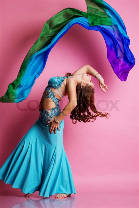 Beautiful Belly Dancer Is Wearing A Blue Costume Stock Image Colourbox