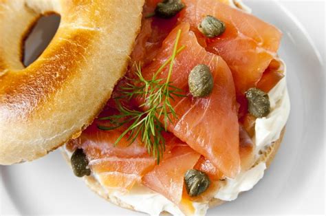 Distribute 1/4 cup brown rice . The Risks of Eating Smoked Salmon | LIVESTRONG.COM