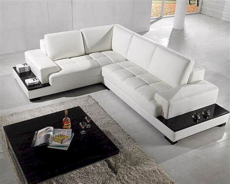 This beautiful leather sofa features clean, modern lines with arms and black wooden tapered legs. 2pc Modern White Leather Sectional Sofa Set 44LT71