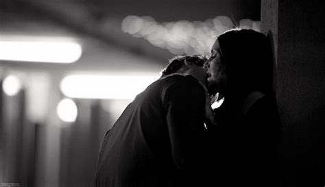 Black And White Photograph Of Two People Kissing