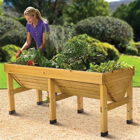 This step by step diy woodworking project is about a waist high raised garden bed plans. How-To: The Pest Thwarting Elevated Garden Gives You Peace ...