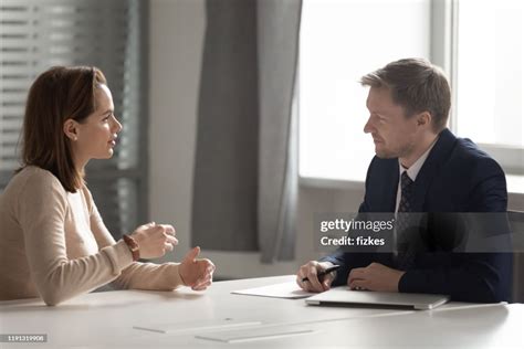 Recruiter Hr Manager Listening To Female Candidate At Job Interview