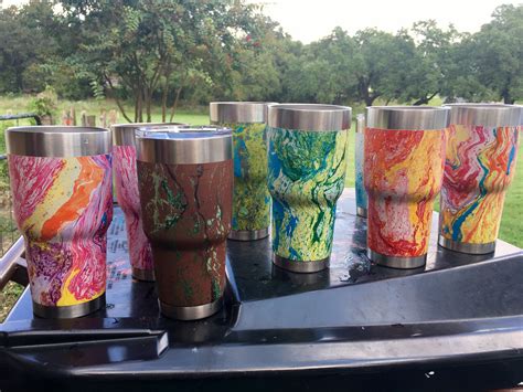 I am inspired to give it a try. Hydro dipped cups | Tumbler cups diy, Diy cups, Paint dipping