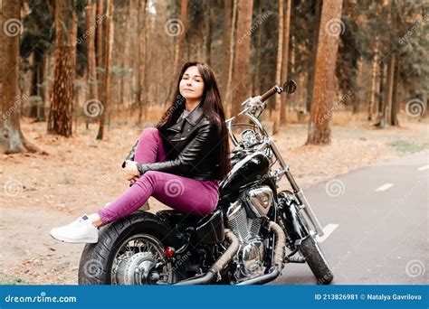 Beautiful Brunette Riding A Motorcycle In The Park Stock Image Image Of Motorbike Nature