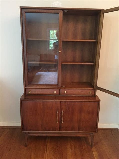 Maybe you would like to learn more about one of these? Vintage Mid-Century Petite China Cabinet by Keller - EPOCH