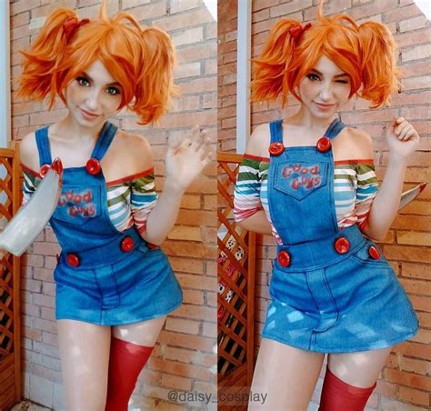 A Woman With Orange Hair Wearing Overalls And Holding A Knife In One Hand While Standing Next To