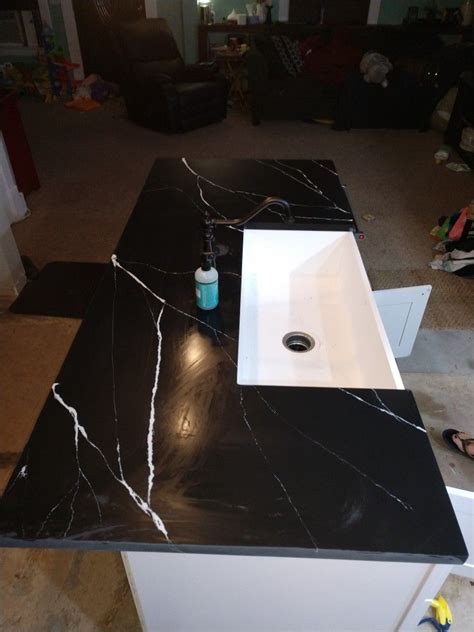 It requires regular polishing to bring back its original shine. Pin by Scoville Farms on Solid surface quartz countertop ...