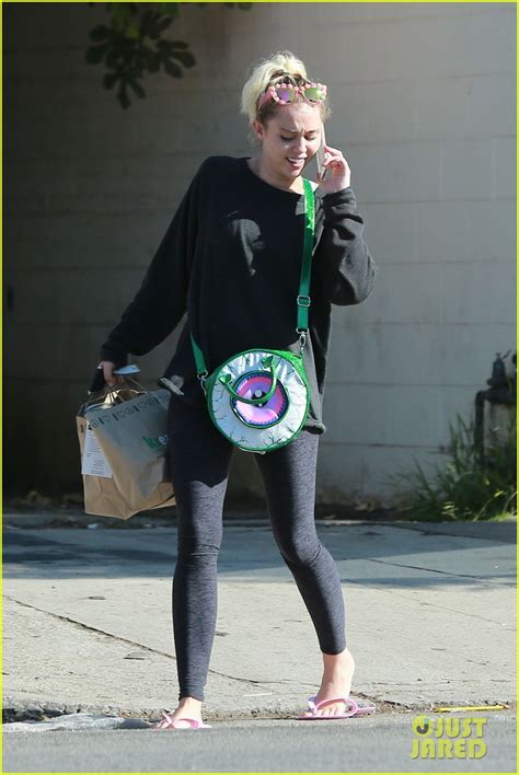Miley Cyrus Strips Off Her Sweater For A Visit To The Nail Salon Photo