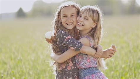 Browse the user profile and get inspired. Two Little Girls Sisters Posing Stock Footage Video (100% ...