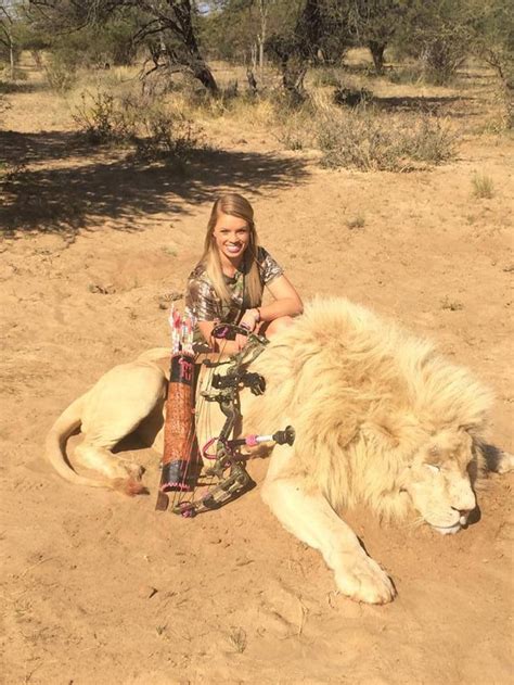 19 Year Old Kendall Jones A Texas Tech Cheerleader Poses With A Young Lion Shes Just Killed