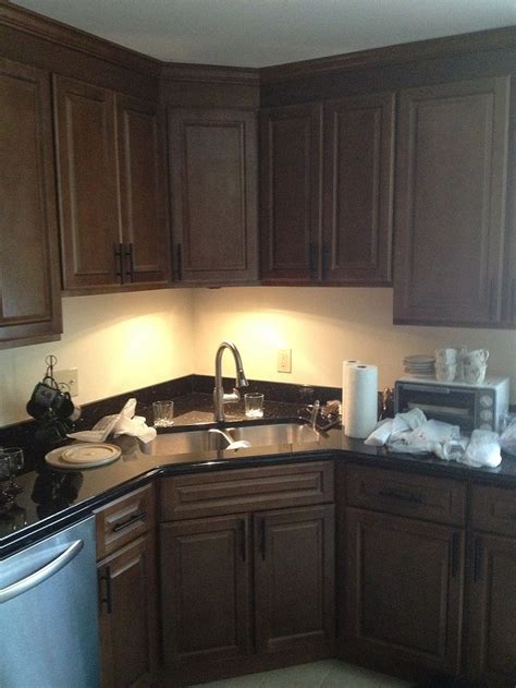 The importance of kitchen base cabinets for stunning look. Two Poor Teachers Kitchen remodel, corner sink, stainless ...