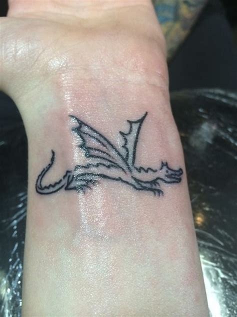 Awesome dragon tattoo designs for men. 39 Attractive Wrist Tattoos