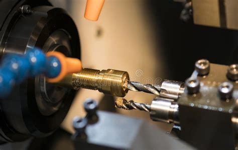 Operator Machining Automotive Part By Cnc Turning Machine Stock Image
